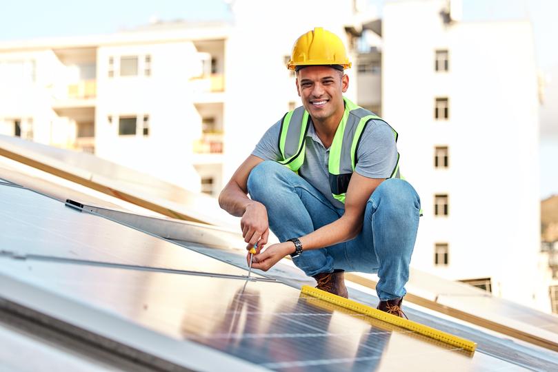 Solar panels being installed on a residential roof in USA